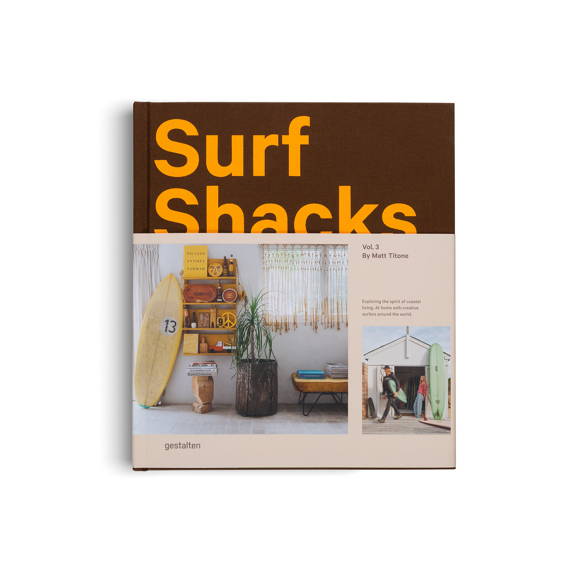 Book titled 'Surf Shacks' with a brown cover and images of surf-related interiors.