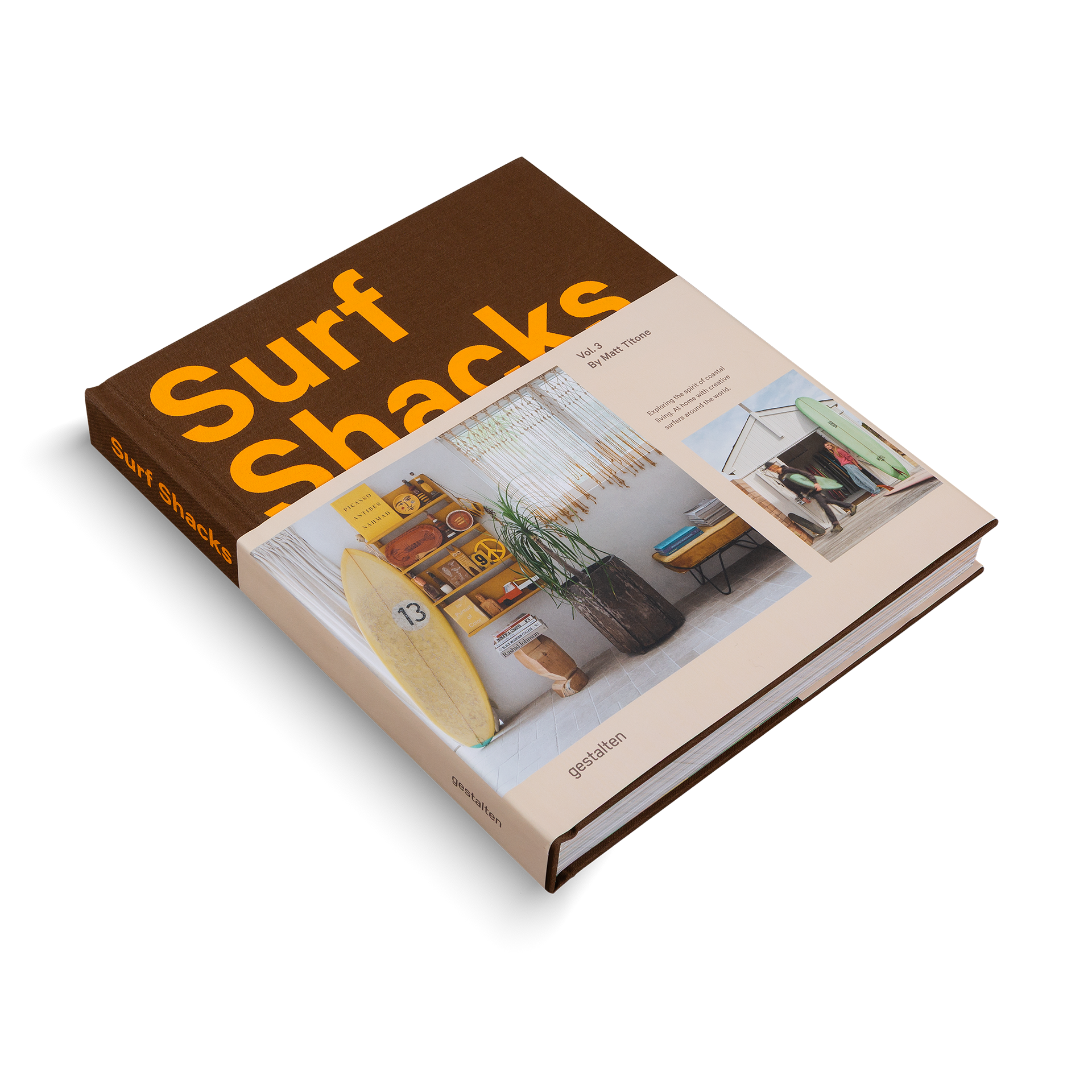 Book titled 'Surf Shacks' with images of surfboards and shacks on the cover.