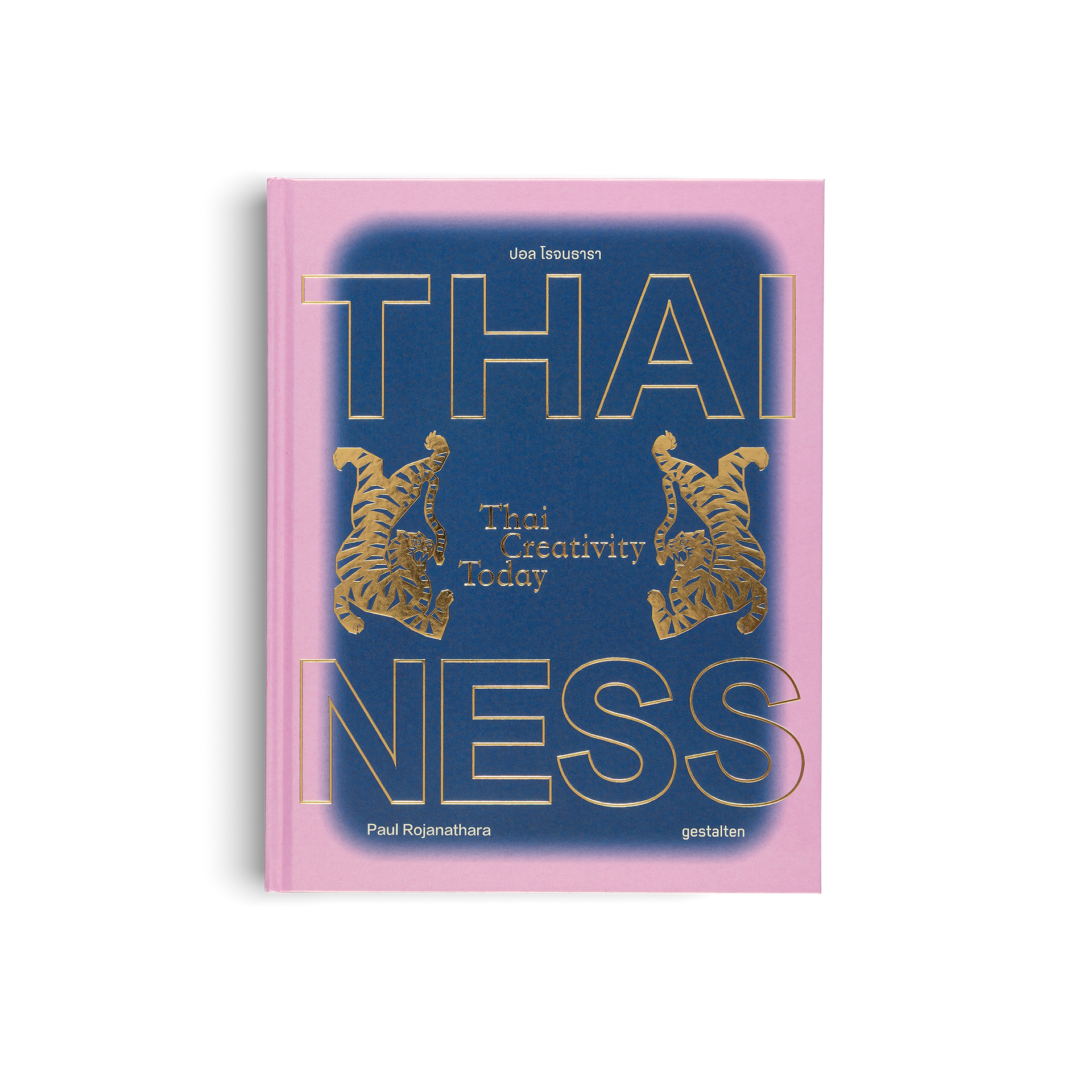 Book cover with 'THAINESS' text and gold tiger illustrations on a pink and blue background