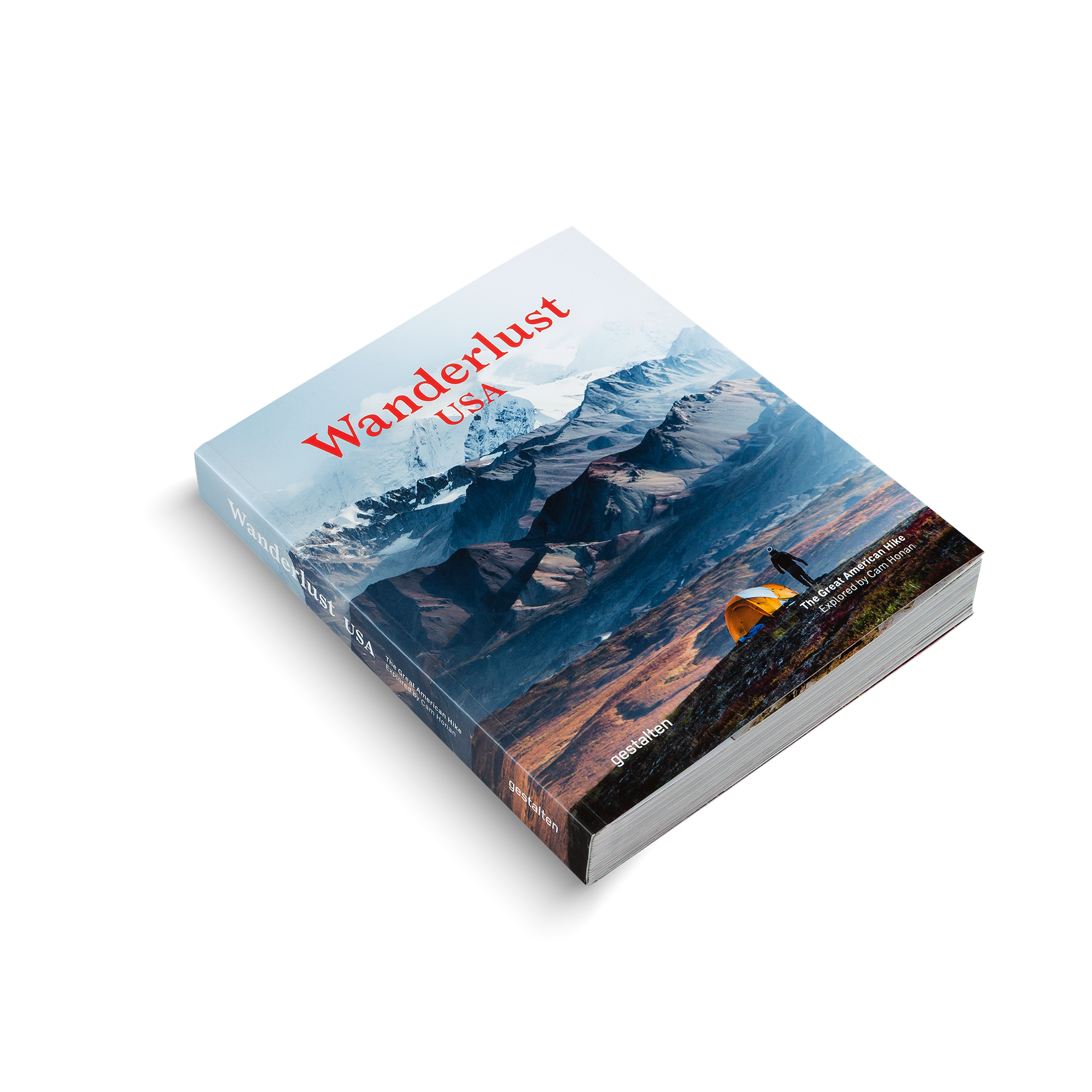 Book titled 'Wanderlust USA' with a mountain landscape on the cover