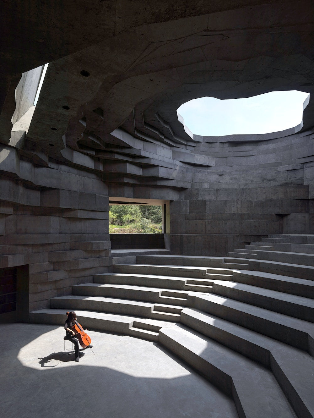 Set in a valley, the monolithic Chapel of Sound provides an acoustic experience following nature’s score. Built by Beijing-based OPEN Architecture, the concert hall near Chengde, China, was designed to enhance active and passive auditory experiences, hosting musical performances and amplifying nature’s own concertos. This project is featured in The ArchDaily Guide to Good Architecture.