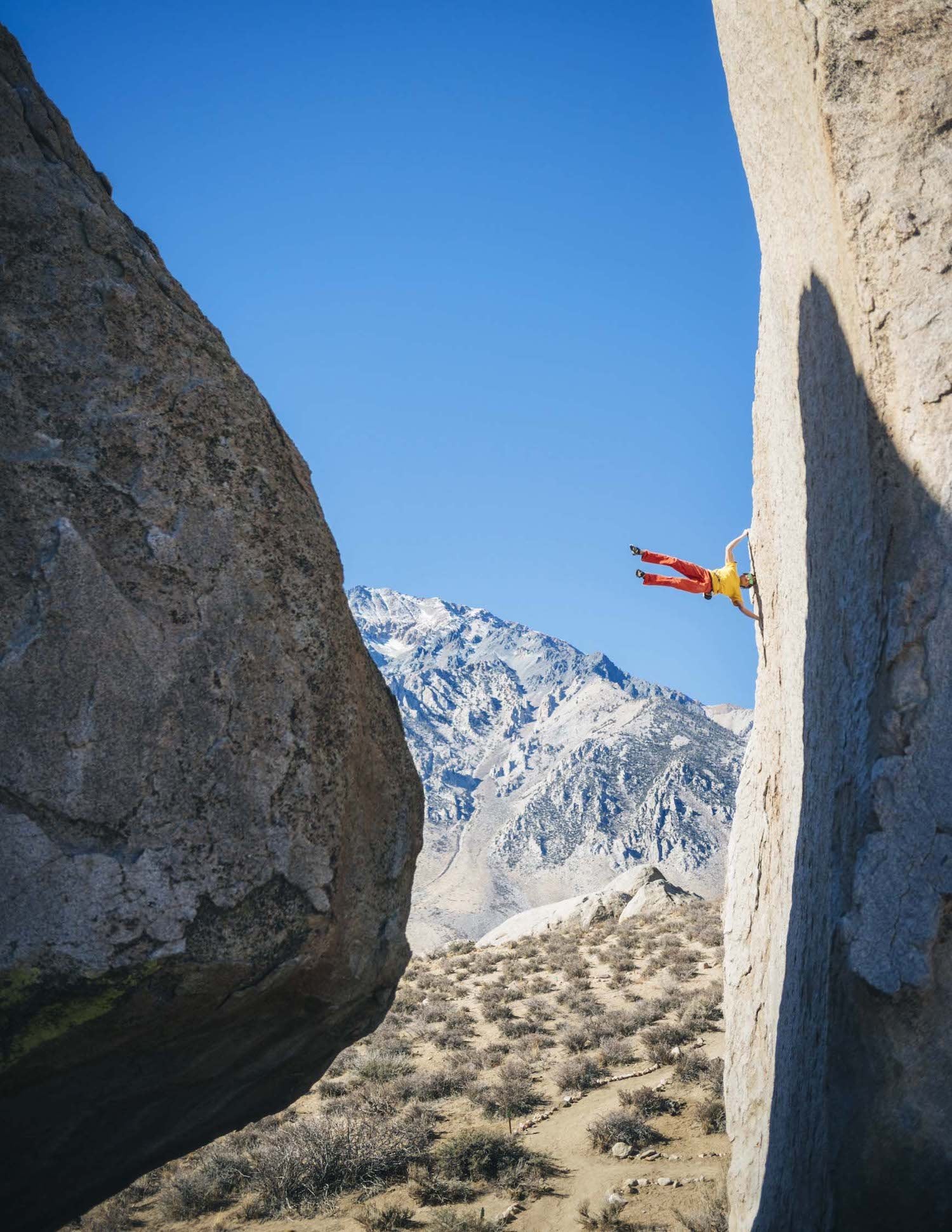 Alex Megos climbing a new route