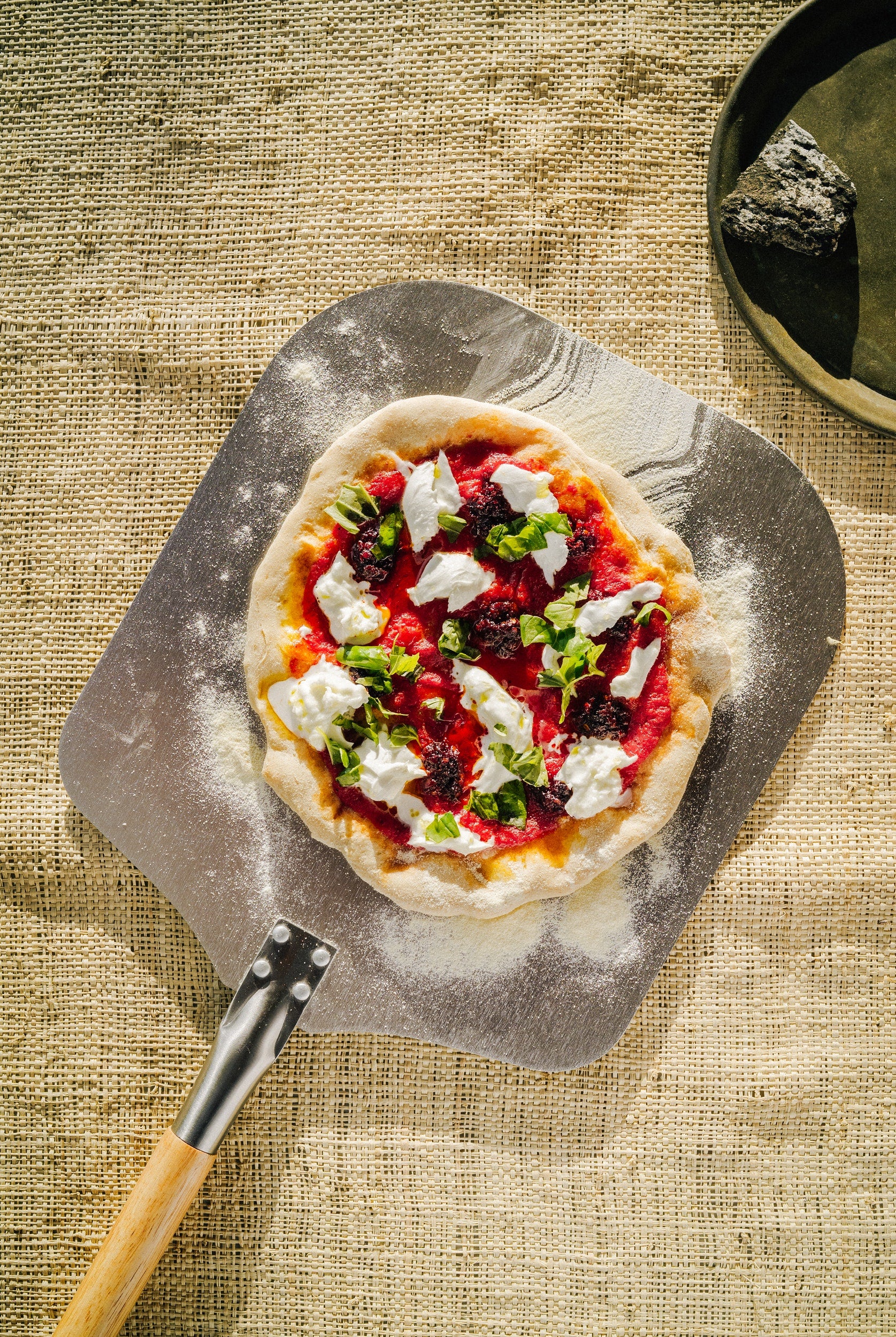 A delicious pizza backed by Pauline Chardin in A Spoonful of Sun.
