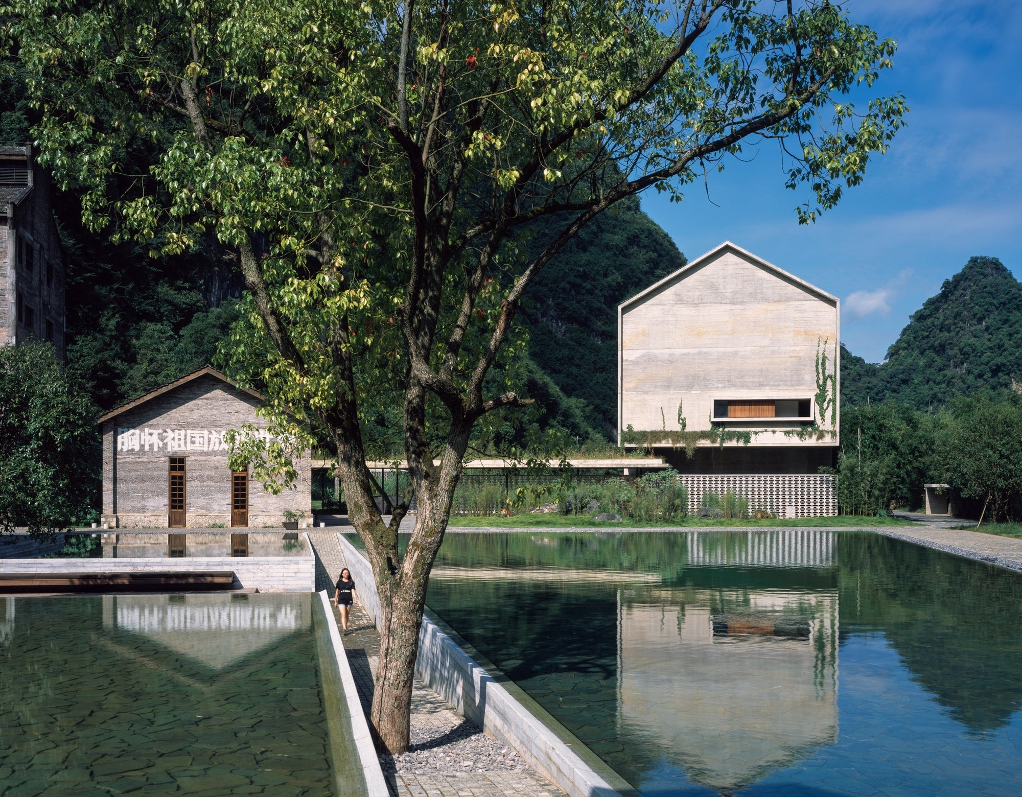 In converting an abandoned 1960s sugar mill in Guangxi to a luxury hotel, Vector Architects restored and repurposed the site with additions consistent with the con- struction of the original buildings. Its approach to reuse is therefore hybrid, combining rehabilitation and new build, radically adapting the previous structures. This project is featured in Building for Change by Ruth Lang and gestalten.