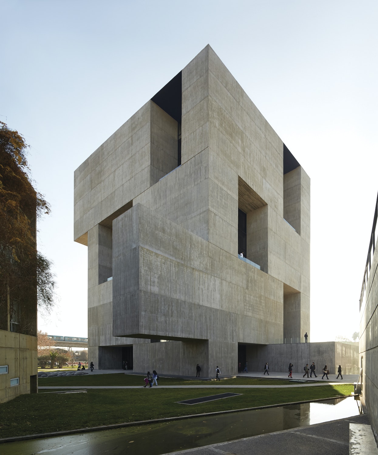 Alejandro Aravena uses geometry to practical effect. The UC Innovation Center in Santiago (previous page and opposite, top) is made of reinforced concrete with deep-set, rectangular windows that minimize interior heat. The Tourist Promenade in Constitución (above) features geometric lookout points that frame the area’s coastal views.