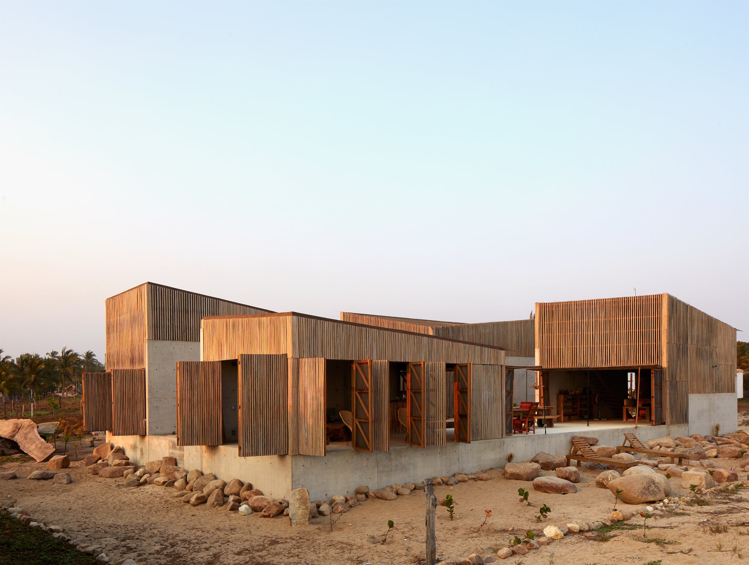 Naila House by BAAQ' is an incredible example of a modern beach house. Find out more in Life's a Beach.