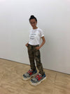 New Yorker Diana “Didi” Rojas is the artist behind the giant ceramic Balenciaga Crocs and Stan Smith
