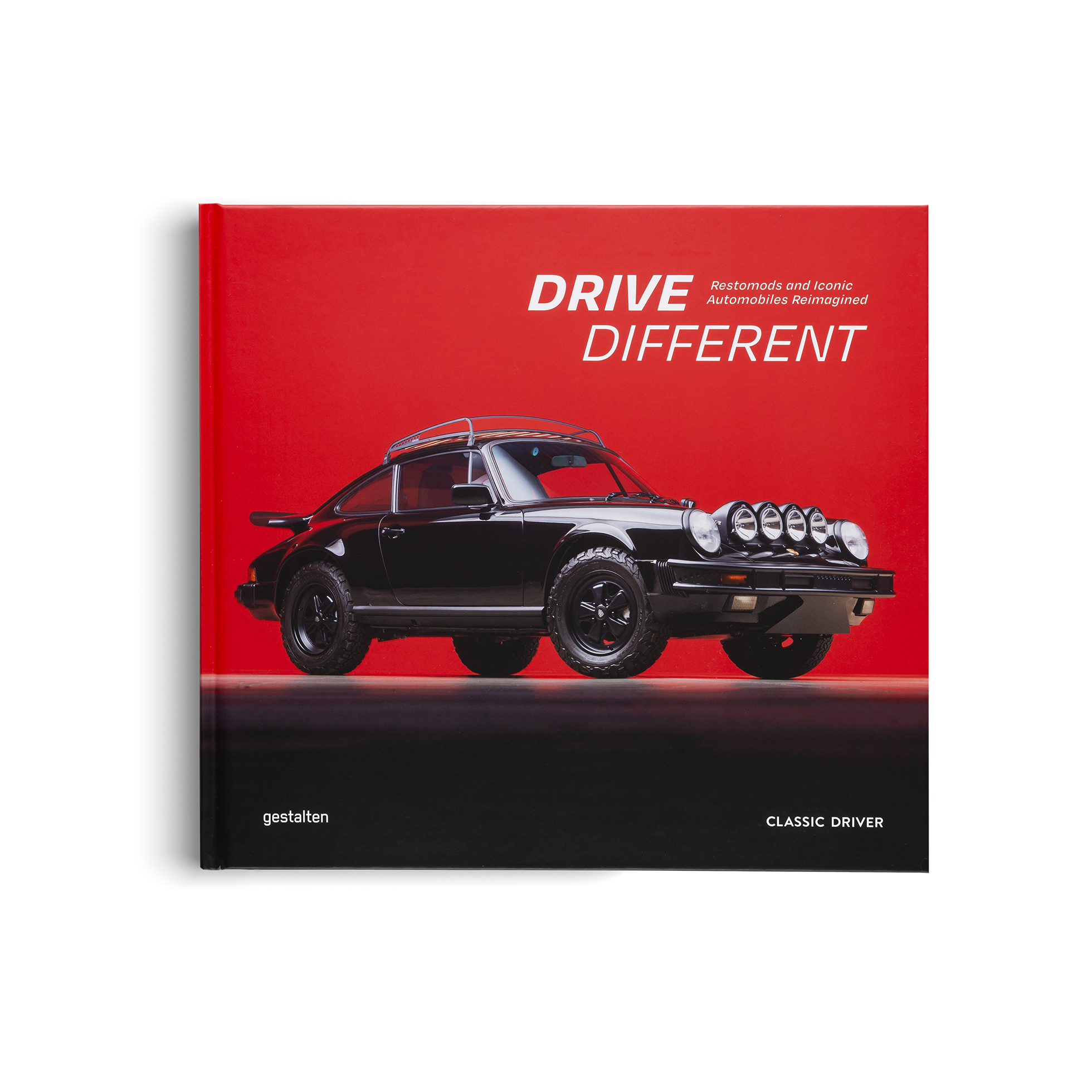 Book cover with a black vintage car on a red background and 'Drive Different' text.