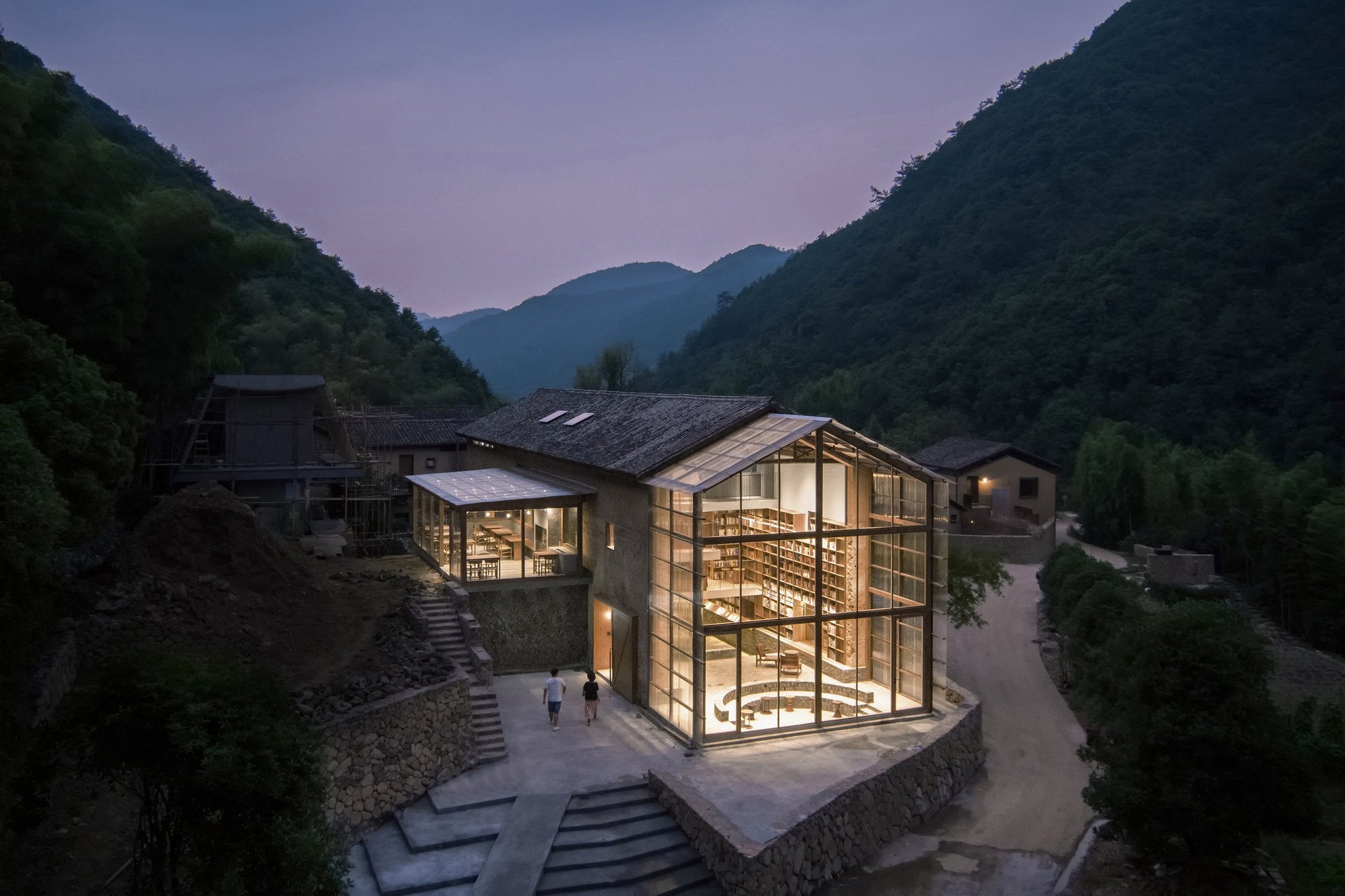 The Capsule Hotel and Bookstore by Atelier tao+c in Qinglongwu Village