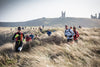 Endurancelife Northumberland is a race for those who love the outdoors in all its forms. You never know what Mother Nature will throw at you. From the sky, the sun or rain (or both) may come. Underfoot, the sandy beaches, rolling dunes, scree, and rock.