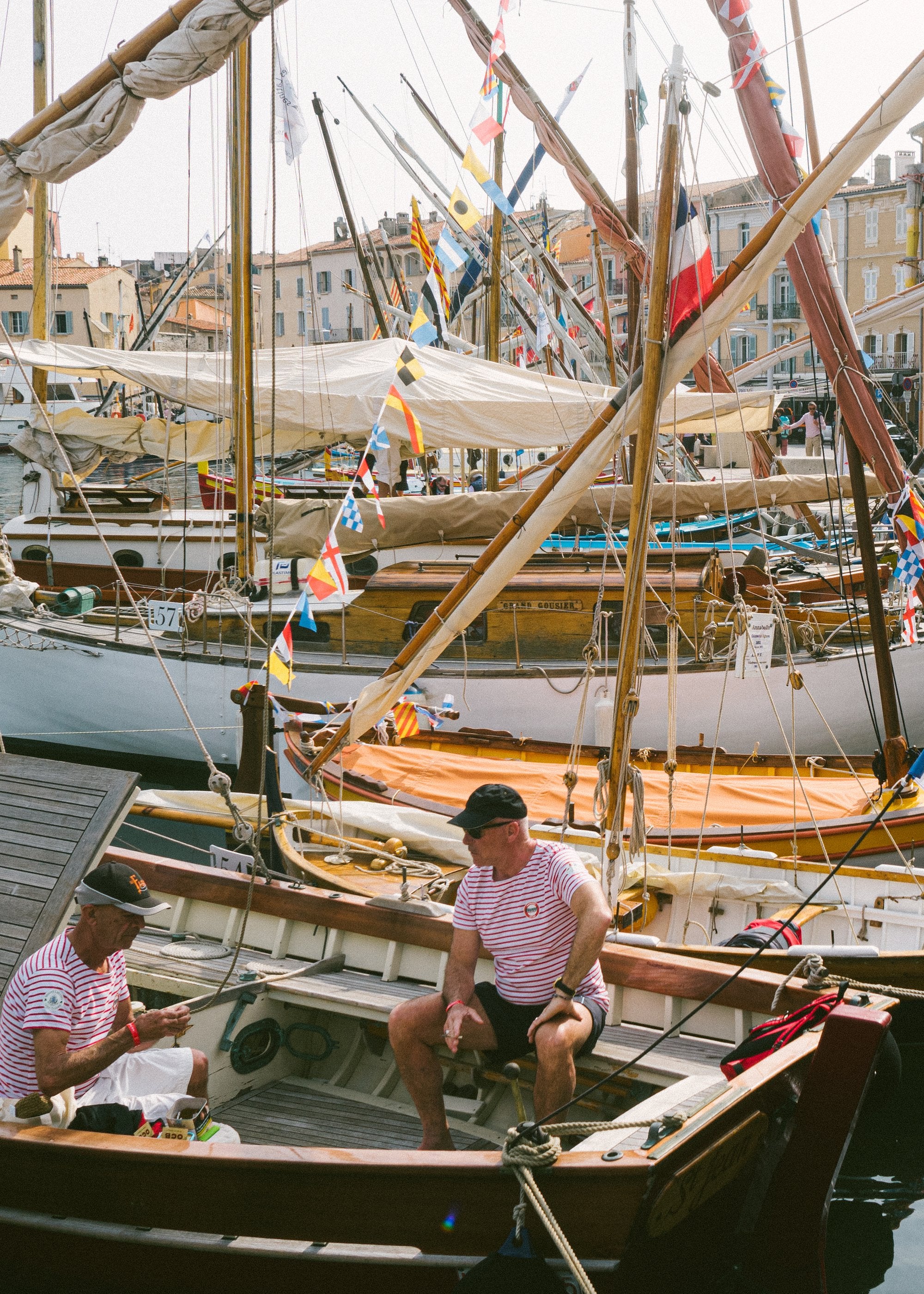 Two sailors in St Tropez harbor in Sailing The Seas