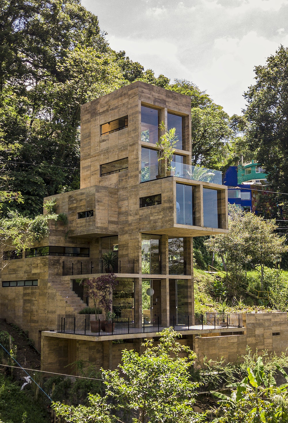 Inside the mesophilic forest along the old road between Xalapa and Coatepec, the polygonal shape of the Zoncuantla Apartments emphasizes the excellent panoramic views of the area from each of its apartments. Inspiring contemplation of the environment, the ground-floor apartment has a thriving garden of endemic vegetation while the upper levels each boast their own terraces. Find out more about this Mexican project in Concrete Jungle.
