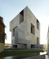 Alejandro Aravena uses geometry to practical effect. The UC Innovation Center in Santiago (previous page and opposite, top) is made of reinforced concrete with deep-set, rectangular windows that minimize interior heat. The Tourist Promenade in Constitución (above) features geometric lookout points that frame the area’s coastal views.
