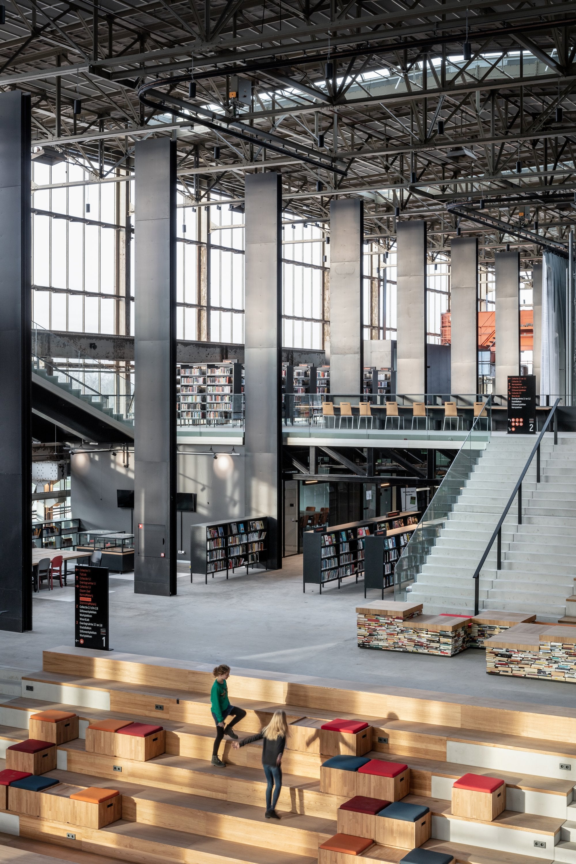 Lochal is a hybrid library in a former railway depot provides a new take on urban community living. Designed by Civic Architects, Mecanoo, and Braaksma & Roos, this library opened in 2018 in Tilburg. Discover more about it in Temples of Books by gestalten.