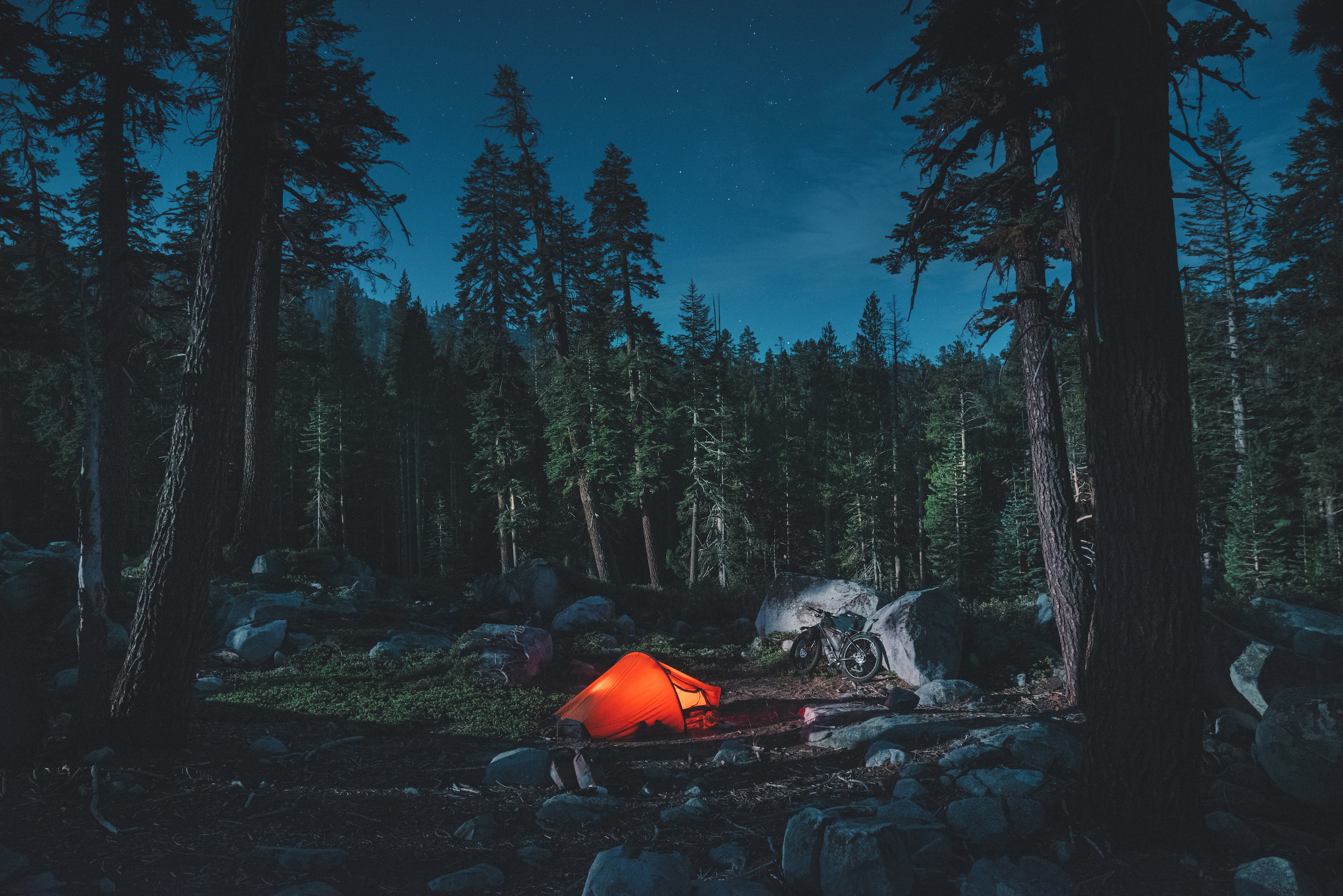 "I’m zipped in my tent in the middle of Yosemite National Park, and I’m having trouble falling asleep. This is bear country, and I’m worried I didn’t take the right precau- tions. My food is in my panniers, which should be airtight. To be safe, I’ve stashed them far from camp. I’m camping farther from the road than usual." says Martijn Doolard in Two Years on a Bike by gestalten